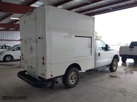 2015 Ford Super Duty F-250 SRW XL with VIN 1FDBF2B63FED21624, listed as a IAAI auction lot 41791384 with 465,396 mi miles. Bid and sale history available at carsss.com. Image 4.
