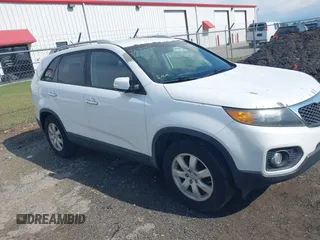 2013 Kia Sorento LX with VIN 5XYKT3A69DG348383, listed as a IAAI auction lot 42195952 with 179,451 mi miles and . Bid and sale history available at carsss.com. Image 1.