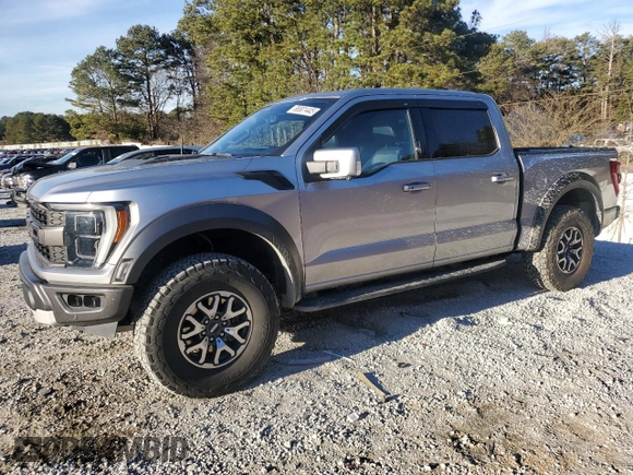 2021 Ford F-150 Raptor with VIN 1FTFW1RG3MFC82314, listed as a Copart auction lot 88801445 with 57,743 mi miles and Salvage Title. Bid and sale history available at carsss.com. Image 1.