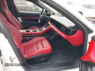 2022 Porsche Taycan z VIN WP0AA2Y10NSA12920, wystawiony jako IAAI lot #42047850 z przebiegiem 22 300 mil mil oraz . Historia ofert i sprzedaży dostępna na DreamBid. Obrazek 5.