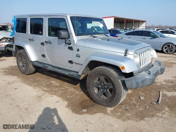 2012 Jeep Wrangler Unlimited Sahara with VIN 1C4HJWEG9CL146750, listed as a IAAI auction lot 41512678 with 94,952 mi miles. Bid and sale history available at carsss.com. Image 1.