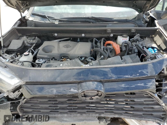 2024 Toyota RAV4 Hybrid LE with VIN 2T3UWRFV7RW200440, listed as a Copart auction lot 55034115 with 56,754 mi miles and Salvage title. Bid and sale history available at DreamBid. Image 13.