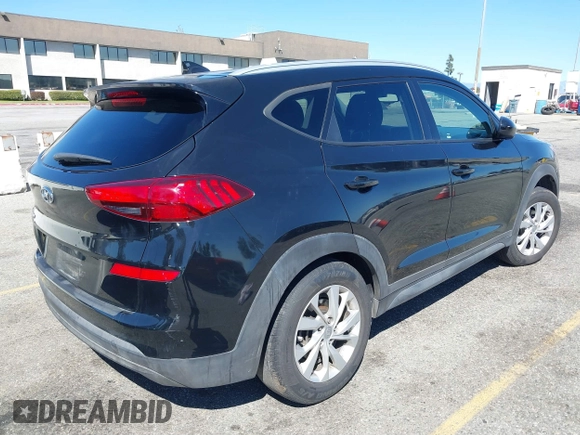 2021 Hyundai Tucson Value z VIN KM8J33A43MU306697, wystawiony jako IAAI lot #41869100 z przebiegiem 129 776 mil mil oraz . Historia ofert i sprzedaży dostępna na DreamBid. Obrazek 4.