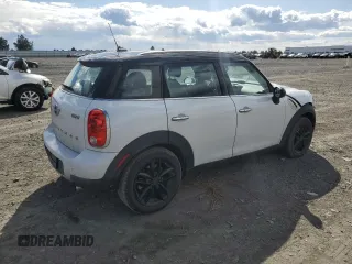 2015 MINI Countryman with VIN WMWZB3C50FWR44801, listed as a Copart auction lot 51957715 with 69,537 mi miles and Salvage Title. Bid and sale history available at DreamBid. Image 3.