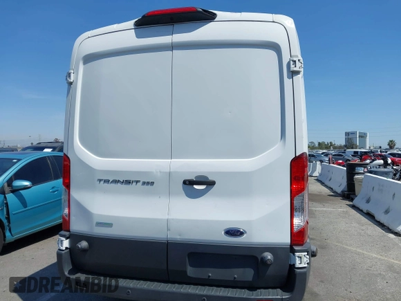 2018 Ford Transit with VIN 1FTBW2CG8JKB46535, listed as a IAAI auction lot 41978414 with 82,316 mi miles and . Bid and sale history available at DreamBid. Image 16.