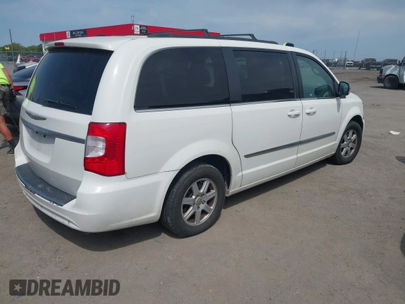2012 Chrysler Town & Country Touring L with VIN 2C4RC1CG7CR156415, listed as a IAAI auction lot 42045371 with 233,306 mi miles and . Bid and sale history available at carsss.com. Image 4.