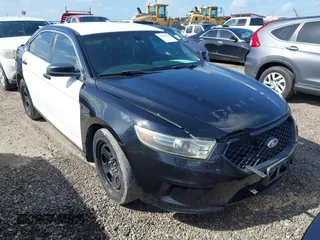 2014 Ford Police Interceptor with VIN 1FAHP2MK8EG185666, listed as a IAAI auction lot 42608018 with 141,523 mi miles and . Bid and sale history available at DreamBid. Image 1.