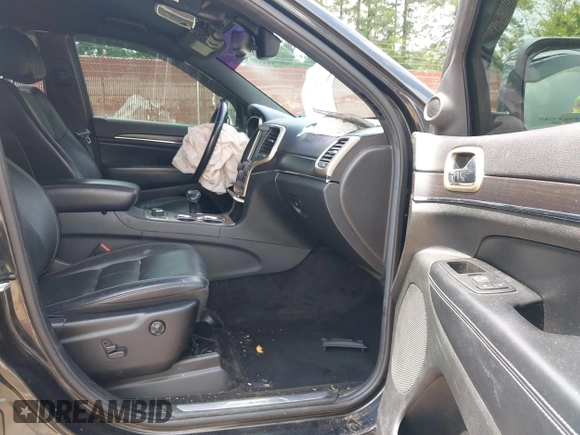 2014 Jeep Grand Cherokee Limited with VIN 1C4RJFBT7EC417586, listed as a IAAI auction lot 42415849 with 133,267 mi miles and . Bid and sale history available at DreamBid. Image 5.