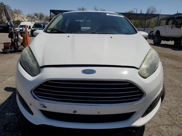 2014 Ford Fiesta S с VIN 3FADP4AJ2EM171595, выставлен на аукционе Copart как лот 60674985 с пробегом 123 805 миль миль и Списание • Salvage title. История ставок и продаж доступна на DreamBid. Изображение 5.