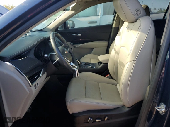 2021 Cadillac XT4 FWD Premium Luxury z VIN 1GYFZCR48MF056210, wystawiony jako Copart lot #73706384 z przebiegiem Nie podano mil oraz Nie do naprawy • Non repairable. Historia ofert i sprzedaży dostępna na DreamBid. Obrazek 7.