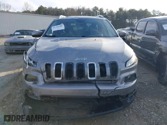 2015 Jeep Cherokee Latitude with VIN 1C4PJMCS8FW570785, listed as a IAAI auction lot 41398481 with 150,400 mi miles and . Bid and sale history available at DreamBid. Image 12.