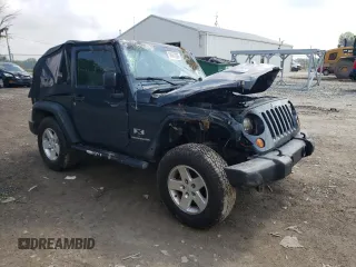 2008 Jeep Wrangler X with VIN 1J4FA24158L563572, listed as a Copart auction lot 58667265 with 162,649 mi miles and Salvage title. Bid and sale history available at DreamBid. Image 4.