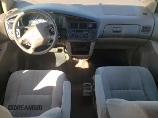 1999 Toyota Sienna CE with VIN 4T3ZF19C6XU098787, listed as a Copart auction lot 47465735 with 176,082 mi miles and Salvage Title. Bid and sale history available at carsss.com. Image 8.