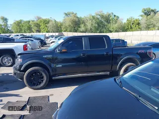 2014 Ford F-150 XL z VIN 1FTFW1ET5EFC21910, wystawiony jako IAAI lot #42317388 z przebiegiem 143 546 mil mil oraz . Historia ofert i sprzedaży dostępna na DreamBid. Obrazek 14.