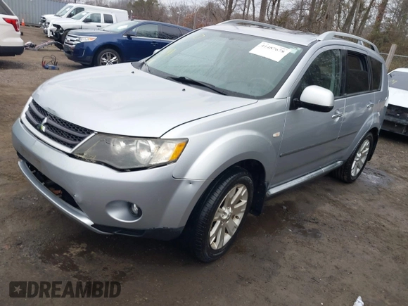 2009 Mitsubishi Outlander SE z VIN JA4MT31W89Z003101, wystawiony jako IAAI lot #41487678 z przebiegiem 90 226 mil mil oraz . Historia ofert i sprzedaży dostępna na DreamBid. Obrazek 17.