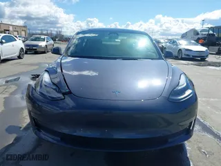 2023 Tesla Model 3 with VIN 5YJ3E1EA0PF698076, listed as a IAAI auction lot 41744362 with 12,838 mi miles. Bid and sale history available at carsss.com. Image 13.