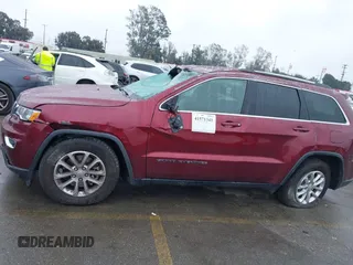 2021 Jeep Grand Cherokee Laredo X with VIN 1C4RJEAG4MC681989, listed as a IAAI auction lot 41571341 with 61,090 mi miles and . Bid and sale history available at DreamBid. Image 14.