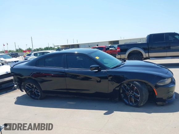 2021 Dodge Charger R/T with VIN 2C3CDXCT4MH684900, listed as a IAAI auction lot 41992358 with 71,386 mi miles and . Bid and sale history available at DreamBid. Image 14.