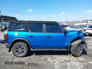 2023 Ford Bronco z VIN 1FMEE5BP1PLA88463, wystawiony jako IAAI lot #41871905 z przebiegiem 36 223 mil mil oraz . Historia ofert i sprzedaży dostępna na DreamBid. Obrazek 14.