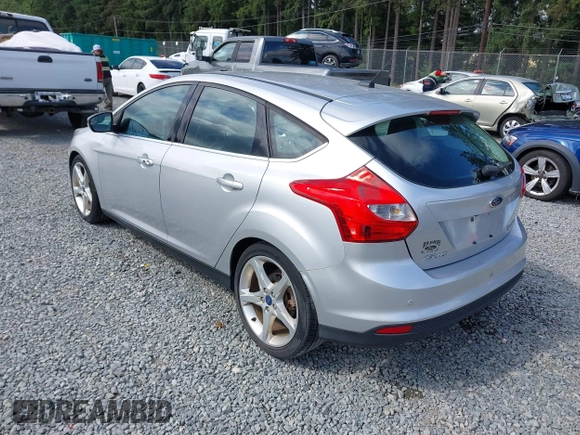 2014 Ford Focus Titanium with VIN 1FADP3N20EL160982, listed as a IAAI auction lot 42565322 with 112,551 mi miles and . Bid and sale history available at DreamBid. Image 3.