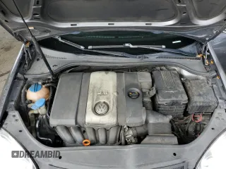 2007 Volkswagen Jetta z VIN 3VWDG71K47M101262, wystawiony jako Copart lot #51469695 z przebiegiem 241 174 mil mil oraz Szkoda całkowita • Salvage title. Historia ofert i sprzedaży dostępna na DreamBid. Obrazek 11.