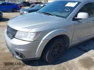 2017 Dodge Journey SXT z VIN 3C4PDCBG0HT530742, wystawiony jako IAAI lot #41997800 z przebiegiem 189 186 mil mil oraz . Historia ofert i sprzedaży dostępna na DreamBid. Obrazek 6.