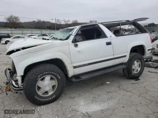 1999 Chevrolet Tahoe with VIN 3GNEK18R7XG230110, listed as a Copart auction lot 82932774 with 148,055 mi miles and Salvage Title. Bid and sale history available at carsss.com. Image 1.