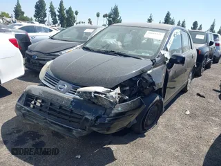 2009 Nissan Versa S with VIN 3N1BC11E19L440957, listed as a IAAI auction lot 40039437 with Not Provided miles and . Bid and sale history available at DreamBid. Image 2.