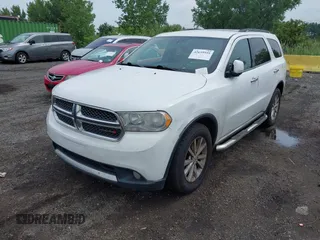 2013 Dodge Durango Crew with VIN 1C4RDJDG9DC667338, listed as a IAAI auction lot 42639559 with 137,020 mi miles and . Bid and sale history available at DreamBid. Image 18.