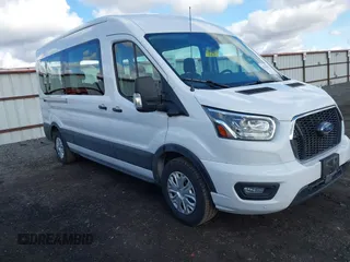 2023 Ford Transit Passenger XL with VIN 1FBAX2C82PKB28840, listed as a IAAI auction lot 41734942 with 20,504 mi miles and . Bid and sale history available at DreamBid. Image 1.