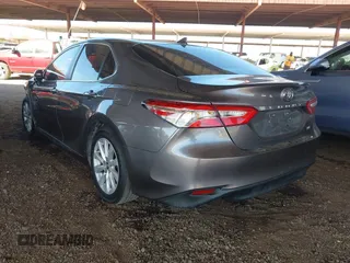 2020 Toyota Camry LE with VIN 4T1C11AK6LU919672, listed as a IAAI auction lot 41726103 with 66,367 mi miles. Bid and sale history available at carsss.com. Image 3.