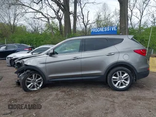 2013 Hyundai Santa Fe Sport z VIN 5XYZUDLA3DG114436, wystawiony jako IAAI lot #42084871 z przebiegiem 96 000 mil mil oraz . Historia ofert i sprzedaży dostępna na DreamBid. Obrazek 14.