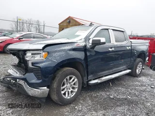 2022 Chevrolet Silverado 1500 LT with VIN 1GCUDDET0NZ597606, listed as a IAAI auction lot 40943441 with 32,673 mi miles and . Bid and sale history available at DreamBid. Image 2.