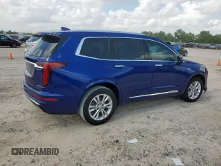 2023 Cadillac XT6 FWD Luxury с VIN 1GYKPAR42PZ167668, выставлен на аукционе Copart как лот 62093575 с пробегом 32 212 миль миль и Списание • Salvage title. История ставок и продаж доступна на DreamBid. Изображение 3.