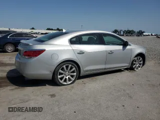 2012 Buick LaCrosse Touring with VIN 1G4GJ5E39CF250328, listed as a Copart auction lot 56873415 with 118,664 mi miles and Salvage title. Bid and sale history available at DreamBid. Image 3.