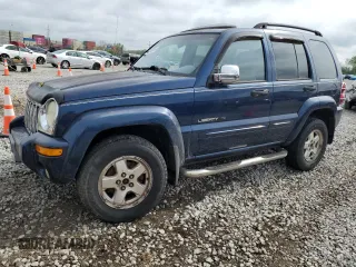2002 Jeep Liberty Limited with VIN 1J4GL58K52W213948, listed as a Copart auction lot 60555885 with 96,415 mi miles and Salvage title. Bid and sale history available at DreamBid. Image 1.