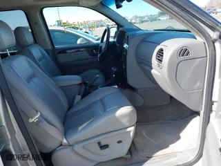 2006 GMC Envoy Denali with VIN 1GKET63M762312848, listed as a IAAI auction lot 41764304 with 115,854 mi miles. Bid and sale history available at carsss.com. Image 5.
