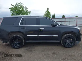 2017 Cadillac Escalade Premium Luxury z VIN 1GYS4CKJ0HR271498, wystawiony jako IAAI lot #42349511 z przebiegiem 52 338 mil mil oraz . Historia ofert i sprzedaży dostępna na DreamBid. Obrazek 13.