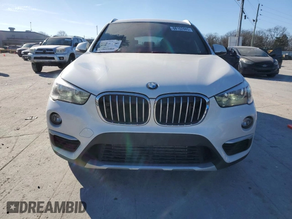 2018 BMW X1 xDrive28i z VIN WBXHT3C3XJ5K32176, wystawiony jako Copart lot #88102885 z przebiegiem 130 394 mil mil oraz Szkoda całkowita • Salvage title. Historia ofert i sprzedaży dostępna na DreamBid. Obrazek 5.