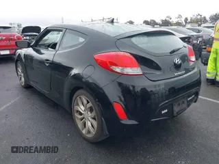 2013 Hyundai Veloster w/Gray Int with VIN KMHTC6AD6DU172892, listed as a IAAI auction lot 41518462 with 167,251 mi miles. Bid and sale history available at carsss.com. Image 3.