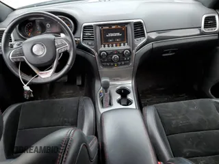 2018 Jeep Grand Cherokee Trailhawk with VIN 1C4RJFLG8JC164774, listed as a Copart auction lot 51699845 with 104,467 mi miles and Salvage title. Bid and sale history available at DreamBid. Image 8.