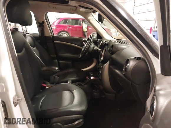 2014 MINI Countryman with VIN WMWZB3C57EWR42476, listed as a IAAI auction lot 41716731 with 94,378 mi miles and . Bid and sale history available at DreamBid. Image 5.