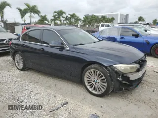 2012 BMW 3 Series 328i with VIN WBA3A5G51CNP17682, listed as a Copart auction lot 59619485 with 100,936 mi miles and Salvage title. Bid and sale history available at DreamBid. Image 4.