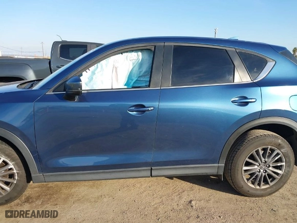 2019 Mazda CX-5 Touring with VIN JM3KFACM1K0517958, listed as a IAAI auction lot 41473681 with NaN miles. Bid and sale history available at carsss.com. Image 14.