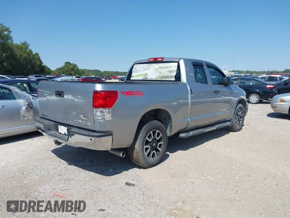 2012 Toyota Tundra z VIN 5TFRM5F19CX046642, wystawiony jako IAAI lot #40099944 z przebiegiem 141 137 mil mil oraz . Historia ofert i sprzedaży dostępna na DreamBid. Obrazek 4.