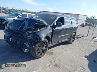 2024 Dodge Durango SRT 392 Premium with VIN 1C4SDJGJ6RC221616, listed as a IAAI auction lot 41280570 with 2,169 mi miles and . Bid and sale history available at DreamBid. Image 17.