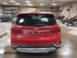 2019 Hyundai Santa Fe SE z VIN 5NMS2CAD3KH125454, wystawiony jako IAAI lot #42400534 z przebiegiem 75 155 mil mil oraz . Historia ofert i sprzedaży dostępna na DreamBid. Obrazek 17.