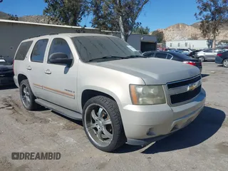 2007 Chevrolet Tahoe LTZ z VIN 1GNFC13J17R234222, wystawiony jako IAAI lot #41636409 z przebiegiem 207 265 mil mil oraz . Historia ofert i sprzedaży dostępna na DreamBid. Obrazek 1.