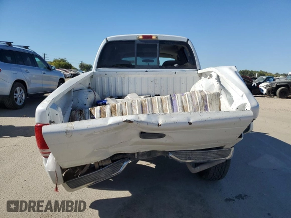 2004 Dodge Dakota SLT z VIN 1D7HL48N94S674827, wystawiony jako Copart lot #72969214 z przebiegiem 248 387 mil mil oraz Szkoda całkowita • Salvage title. Historia ofert i sprzedaży dostępna na DreamBid. Obrazek 6.