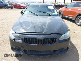 2013 BMW 5 Series 535i xDrive with VIN WBAFU7C51DDU73061, listed as a IAAI auction lot 41960663 with 106,591 mi miles and . Bid and sale history available at carsss.com. Image 6.